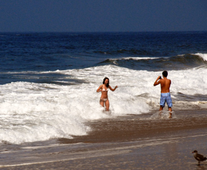 Skin Care is important when enjoying the sun / Couple Enjoying Manhattan Beach (c) 2008 Ted Grellner